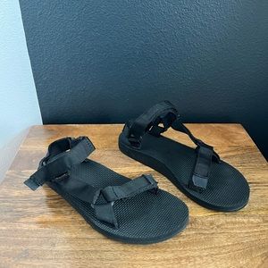 Women’s black Tevas sandals
